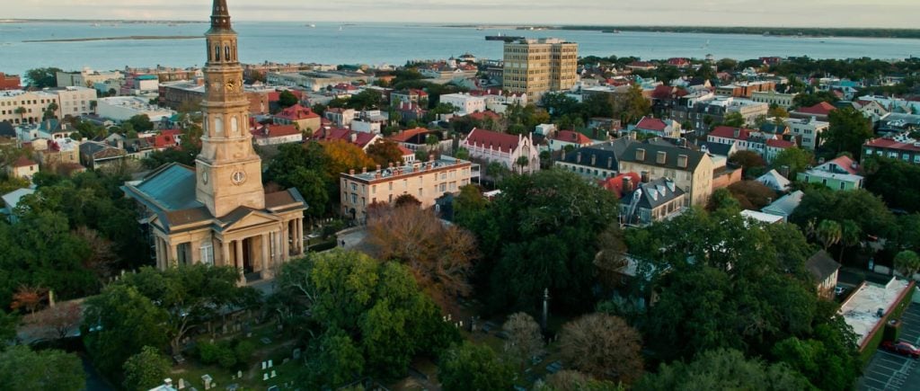 Aerial View Over Rooftops of Charleston, South Carolina at Sunset