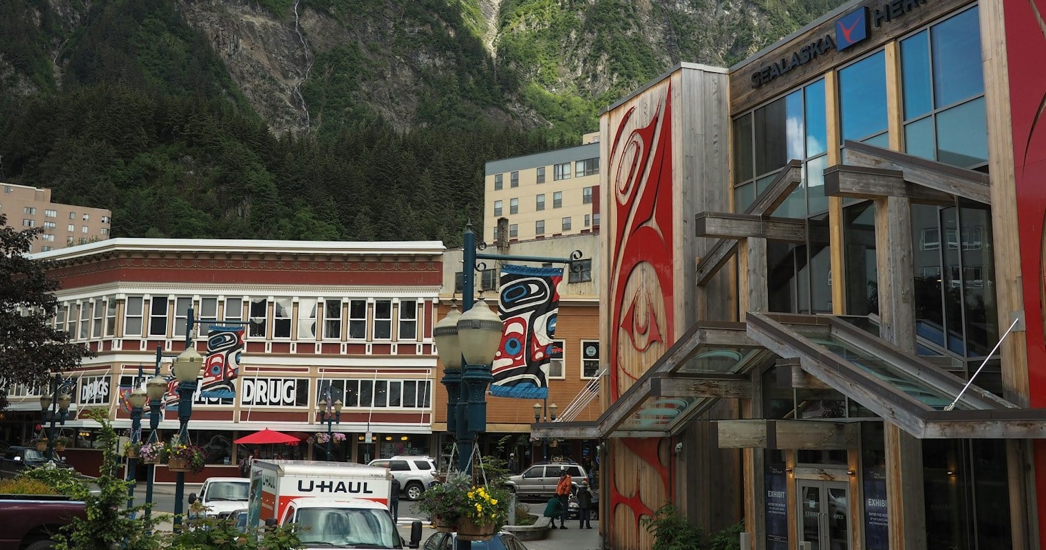 Downtown Juneau and the Sealaska Heritage building under the mountains