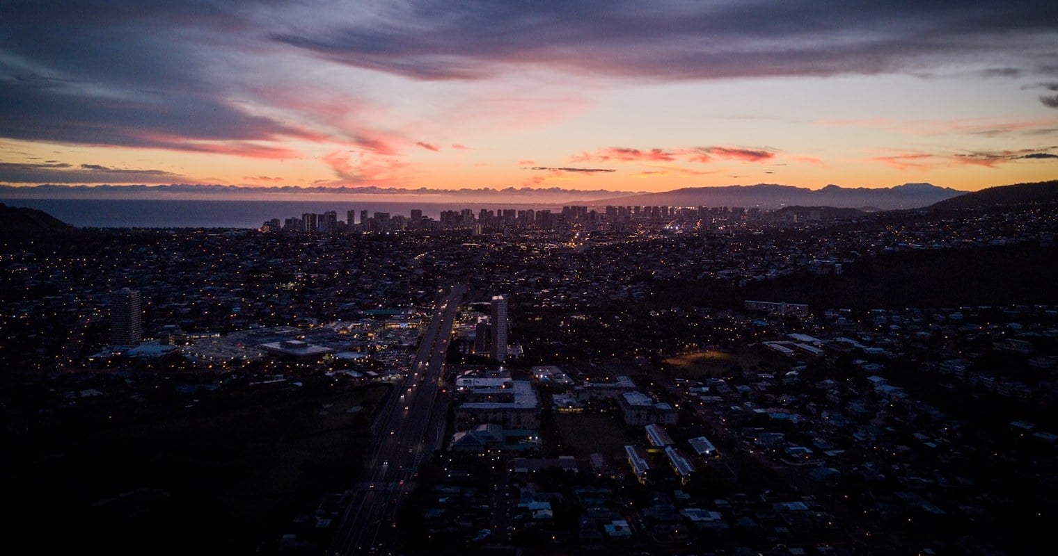 Honolulu's skyline at sunset from the Oahu hills