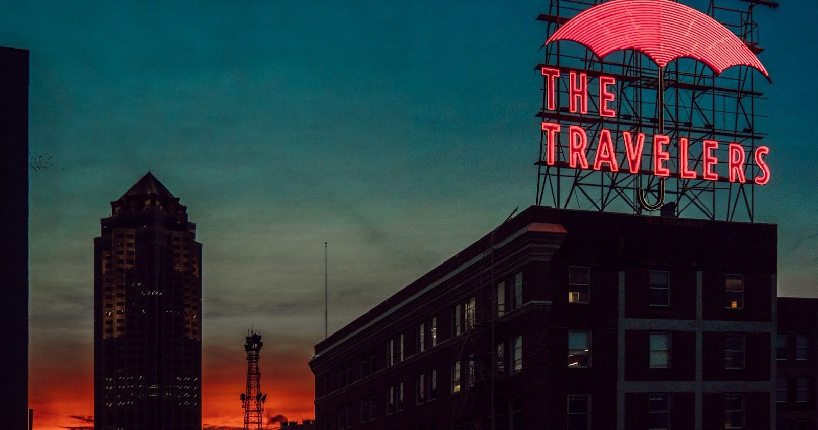 The Travelers umbrella sign over downtown Des Moines, Iowa at dusk