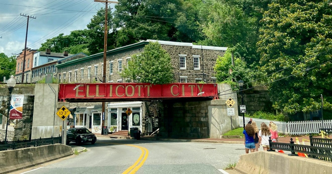 The red ELLICOTT CITY railroad trestle over Main Street in Ellicott City, Maryland
