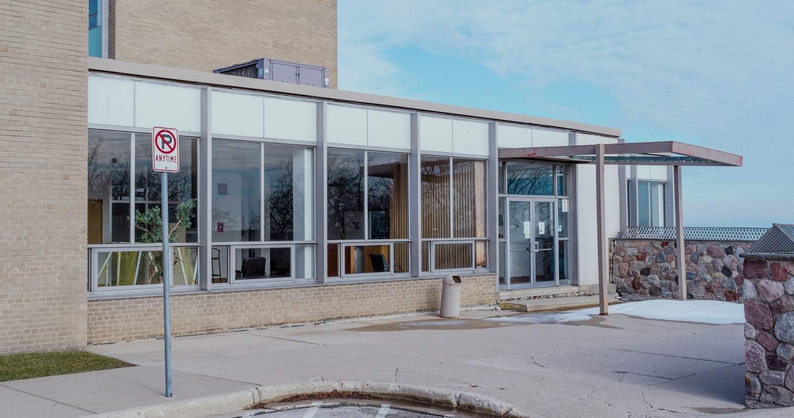 Glass and stone building on a clear day in Racine, Wisconsin