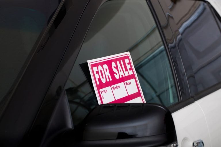 For Sale sign in Car
