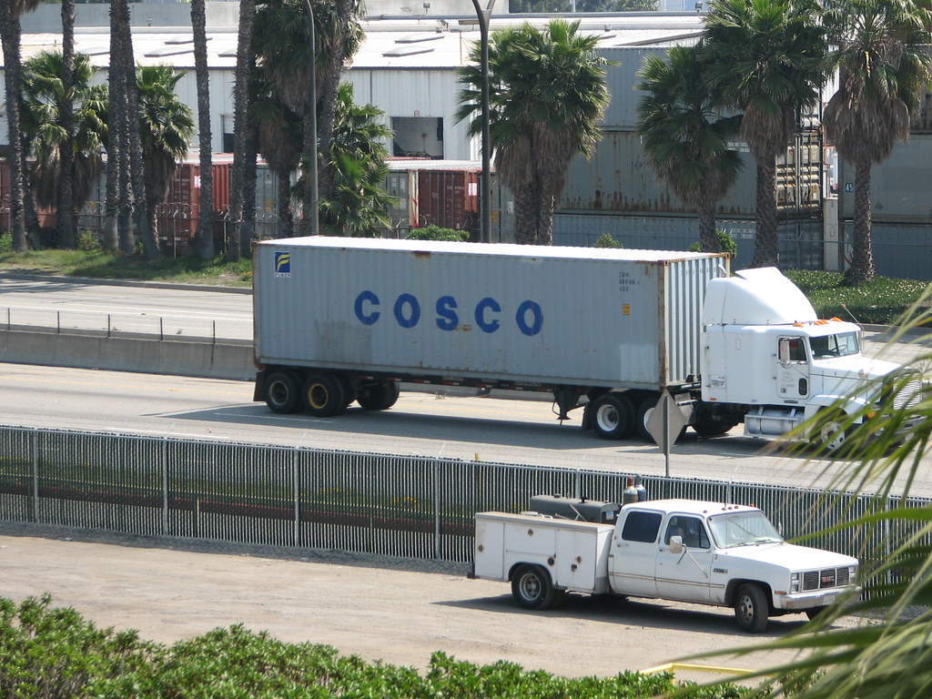 Getting Your Container off a Flatbed or Step-Deck Truck