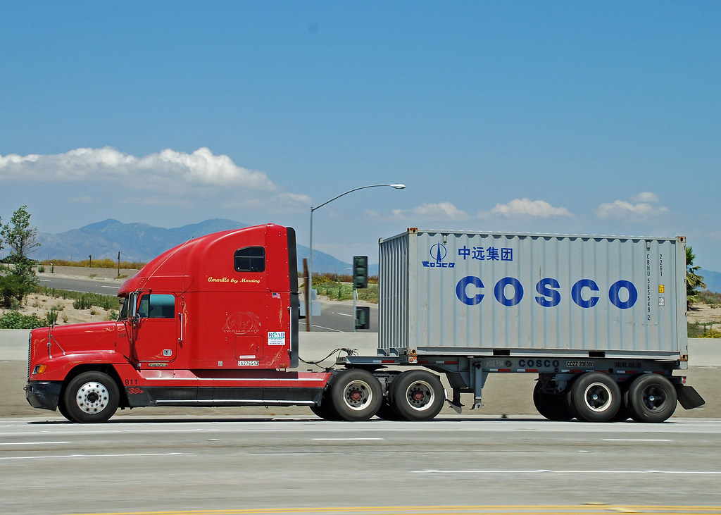Moving The Shipping Container On/Off A Flatbed Or Step-Deck Truck
