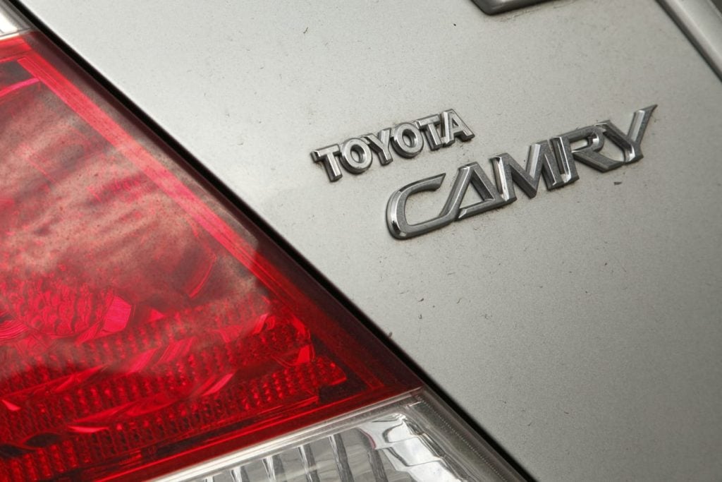 Toyota Camry badge on the rear of a silver car