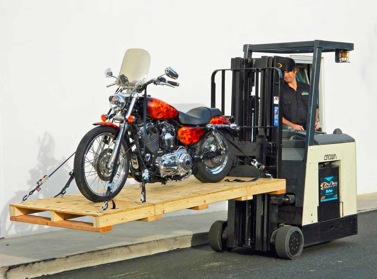 4. Load the motorcycle onto the shipping container