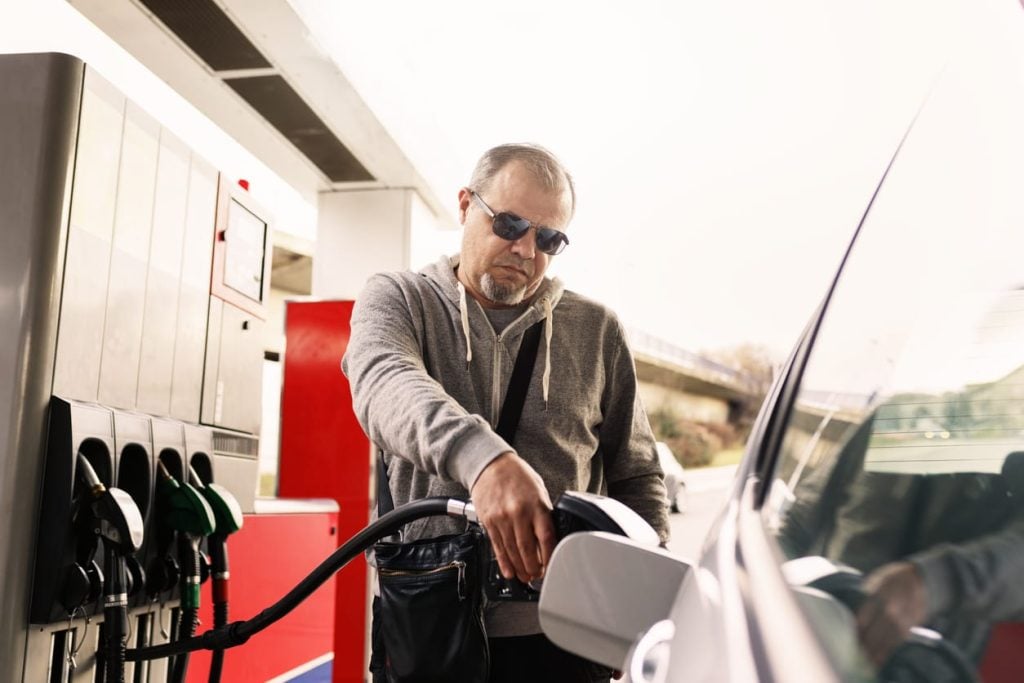 What is the Reason that Gas Tanks are not Located on the Same Side in all Cars