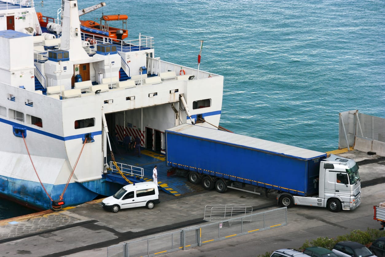 Unloading cars from the ship to a truck