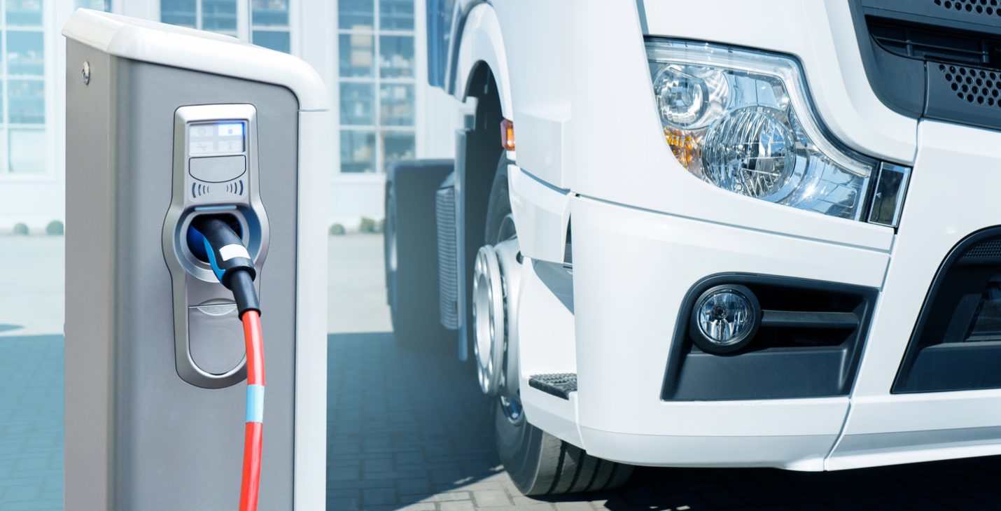 Electric vehicle connected to a charging point
