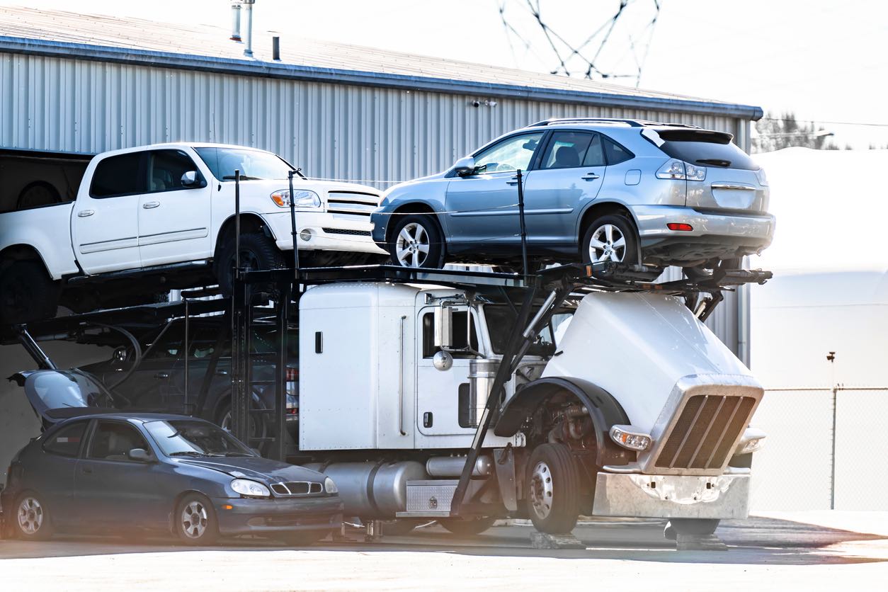 Vehicles are Shipped in Enclosed Transport Carriers
