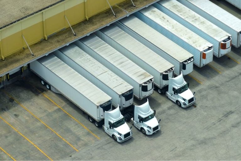 Aerial view of trailers parked in rows at a yard