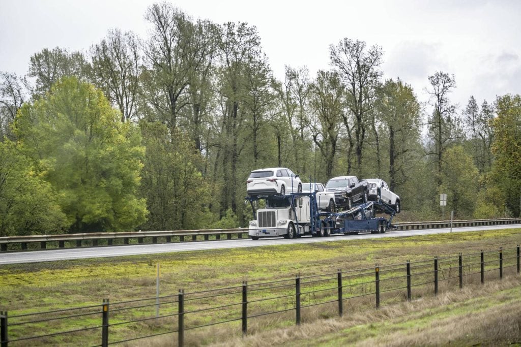 The Pros and Cons of Open Car Shipping Services