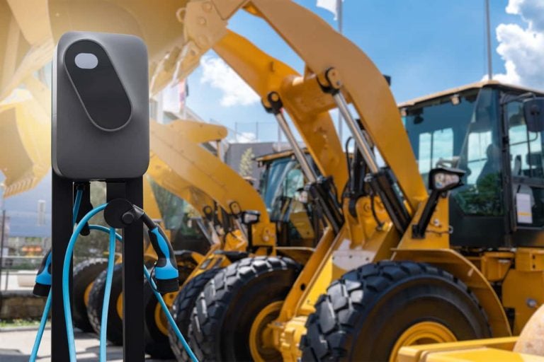 Electric construction machines with charging station.