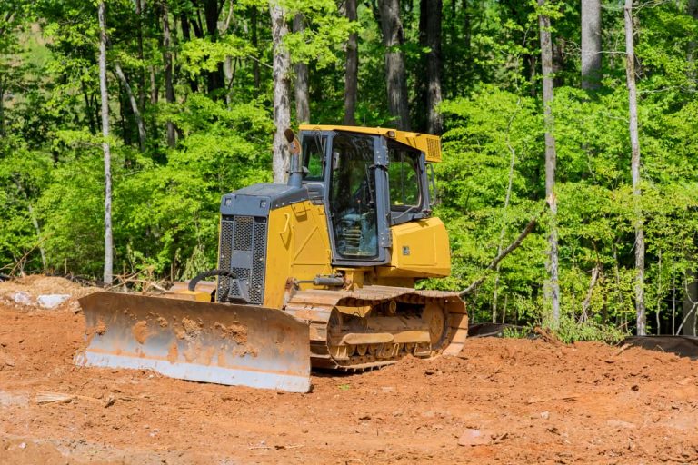 Excavators during landscaping works at construction site