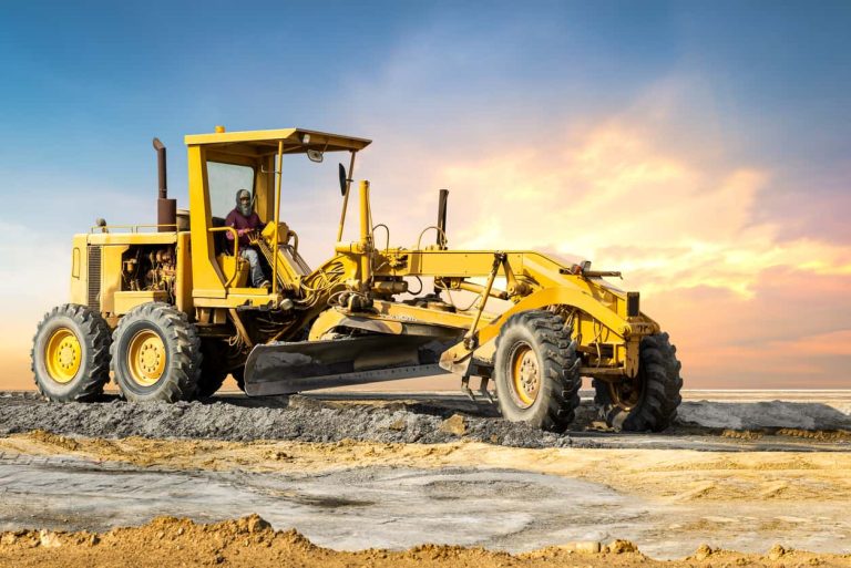 Motor grader on ground