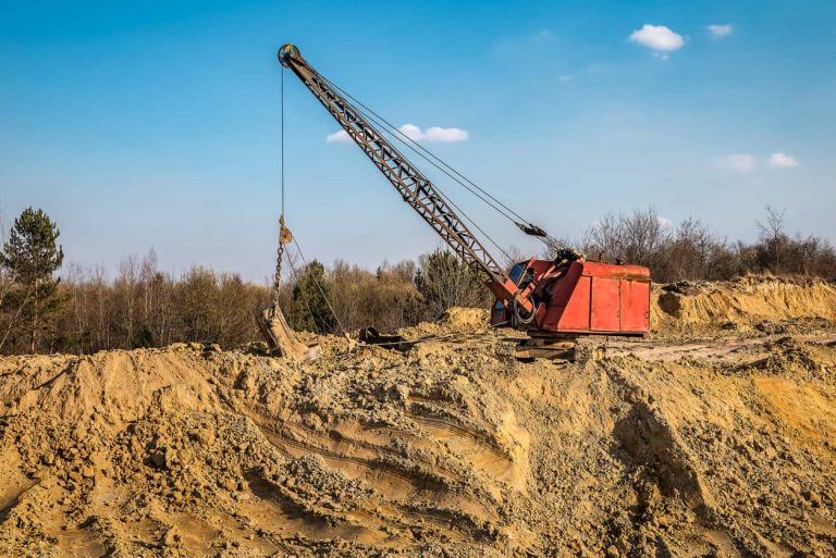 Working dragline excavator on the clay quarry