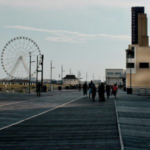 The Atlantic City Boardwalk on a quiet summer morning with the observation wheel in the distance