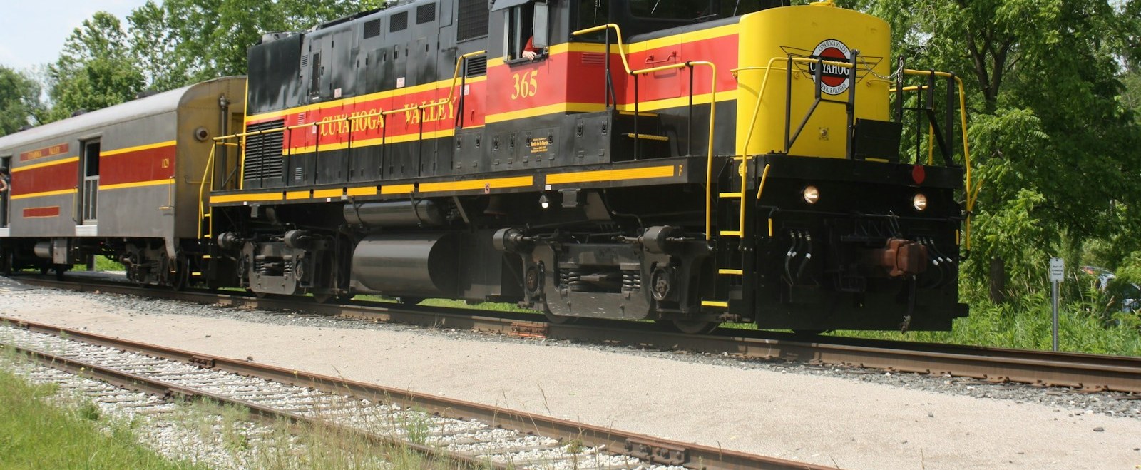 The Cuyahoga Valley scenic railroad locomotive passing through Cuyahoga Falls