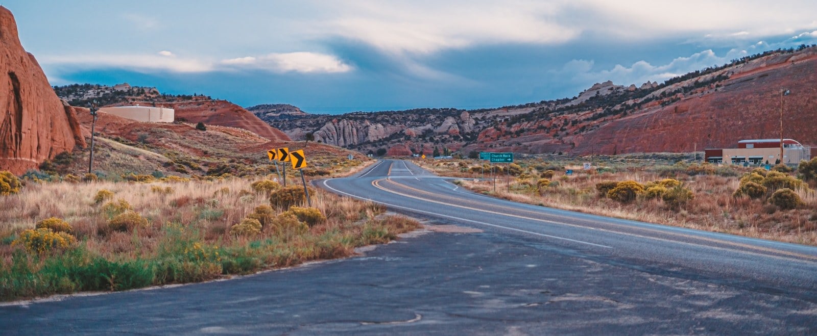 Red rock cliffs beside the highway approaching Gallup New Mexico