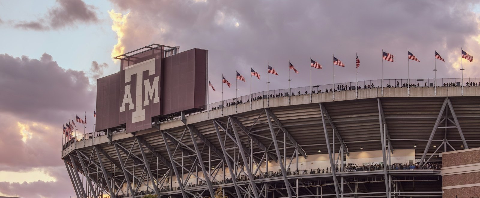 Kyle Field with the Texas A&M logo and flags in College Station, Texas