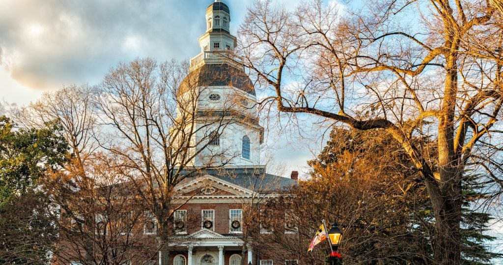 The Maryland State House dome above autumn trees in Annapolis, Maryland