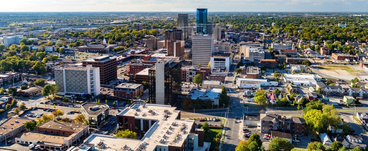 Aerial view of downtown Lexington, Kentucky under a blue sky