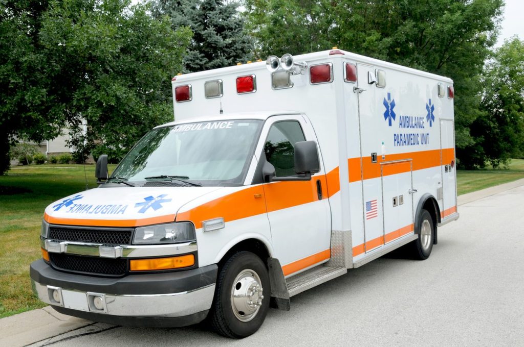 Ambulance parked outside a station