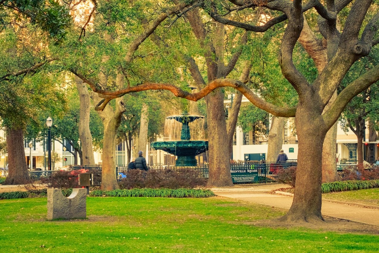 Fountain and live oaks in Bienville Square in downtown Mobile Alabama