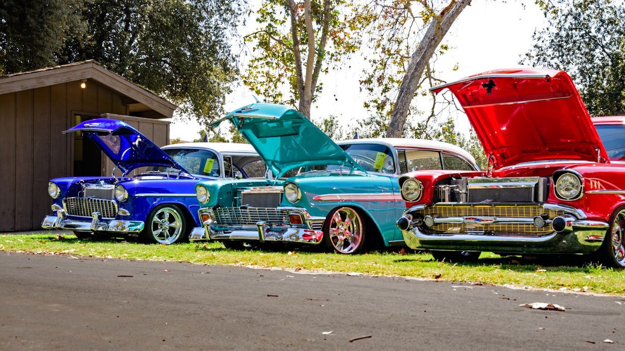 Classic cars displayed at a car show