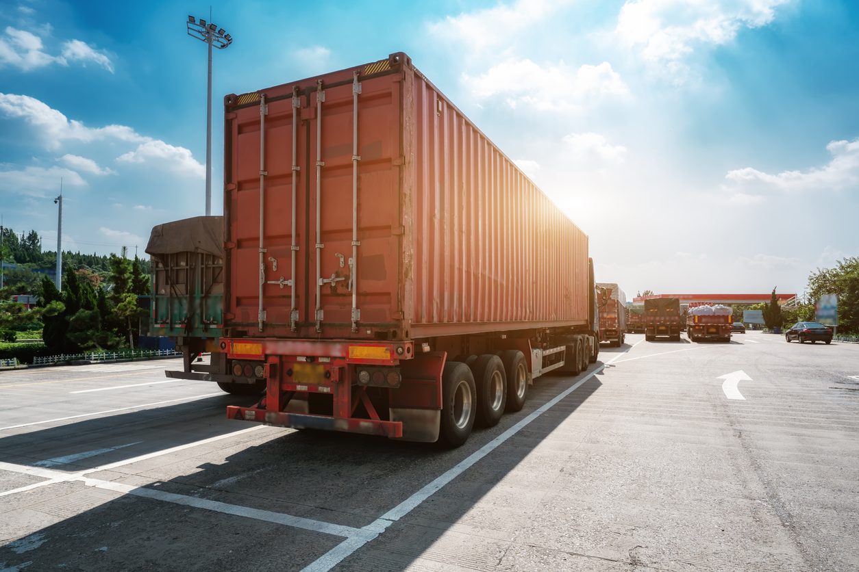 Shipping container mounted on a road chassis