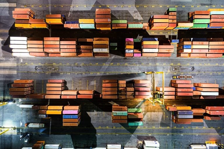 Aerial view of stacked containers at a port terminal