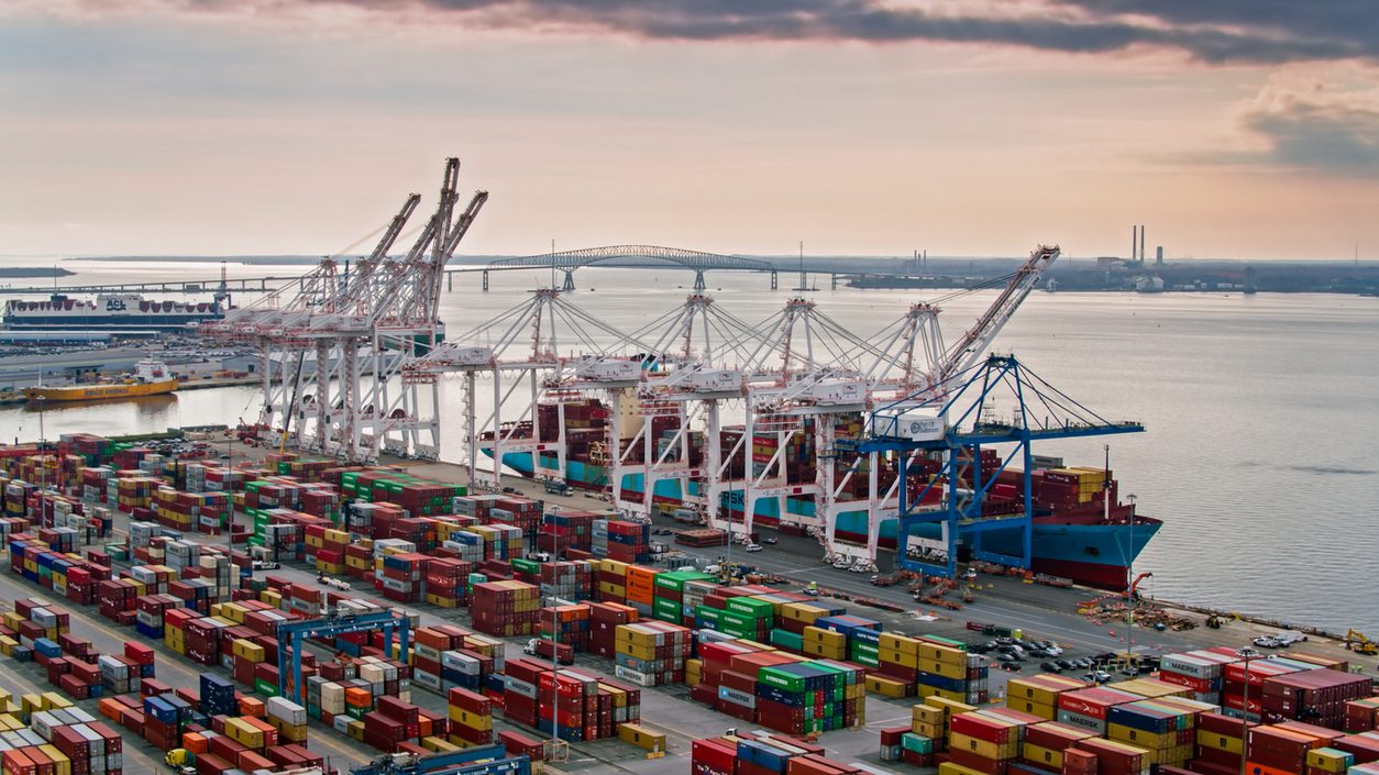 Container ship being loaded at a port terminal