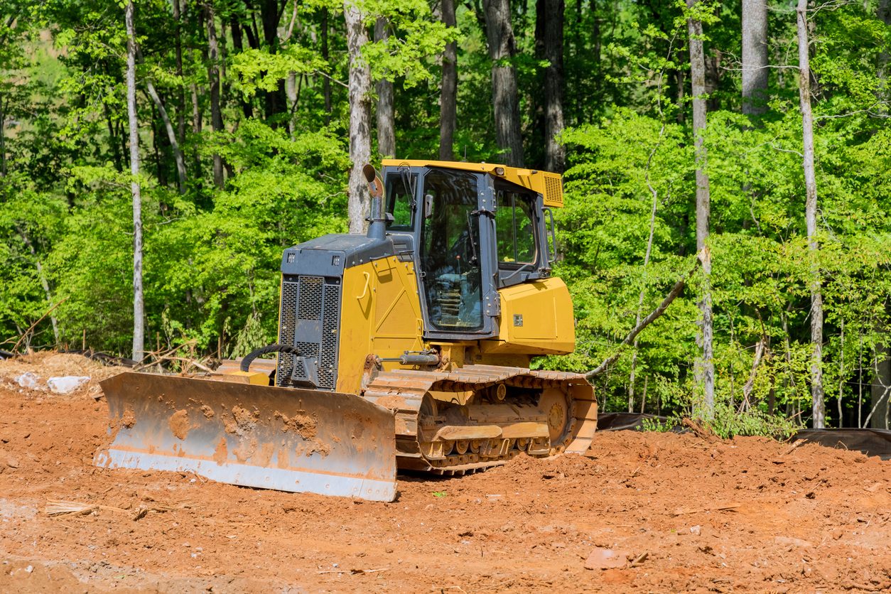 Crawler dozer working a cleared site