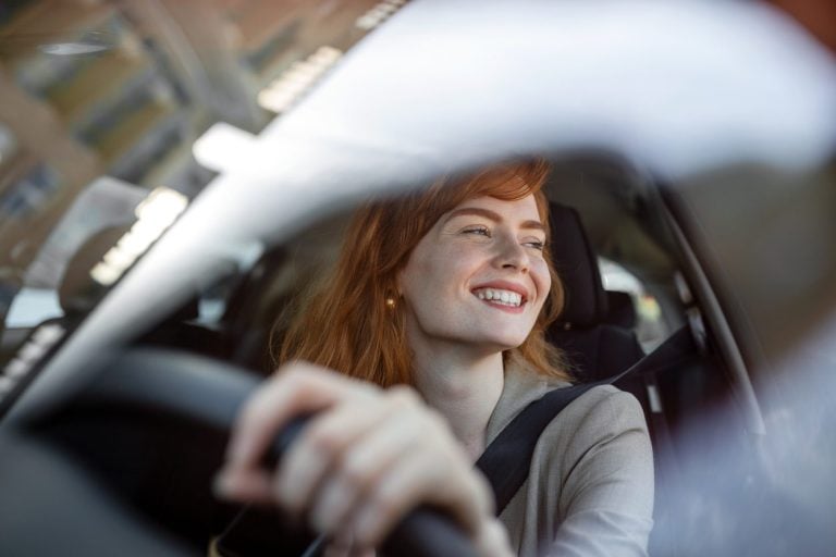 Driver at the wheel of a car on the open road