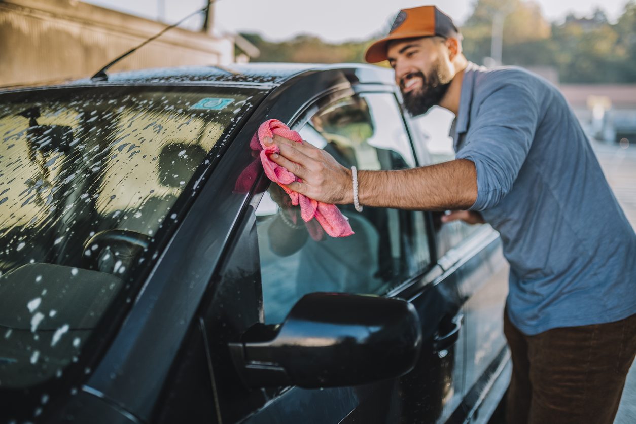 Drying a car after washing it before shipping