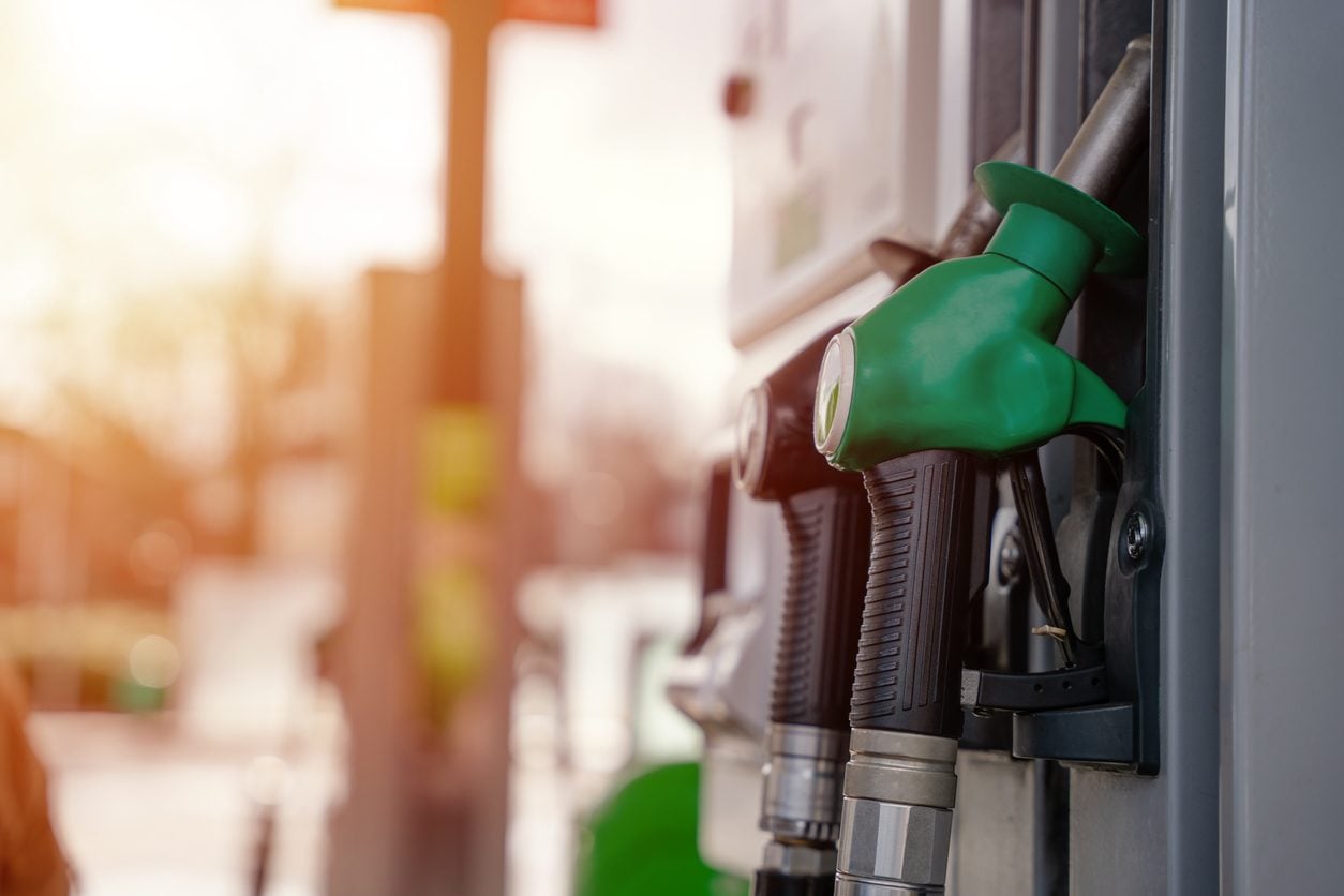 Fuel pump nozzles at a gas station