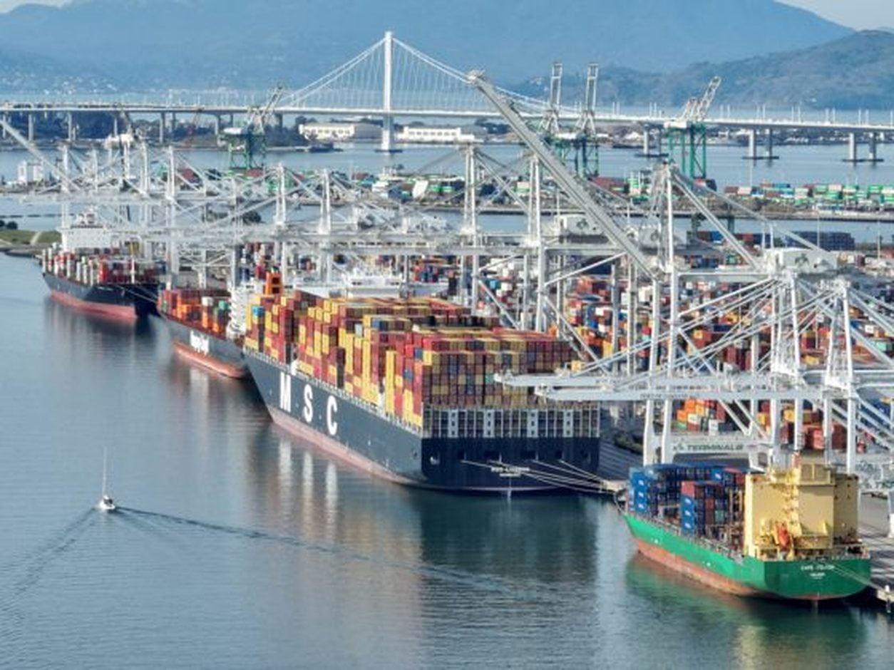 Aerial view of container ships and cranes at the Port of Oakland
