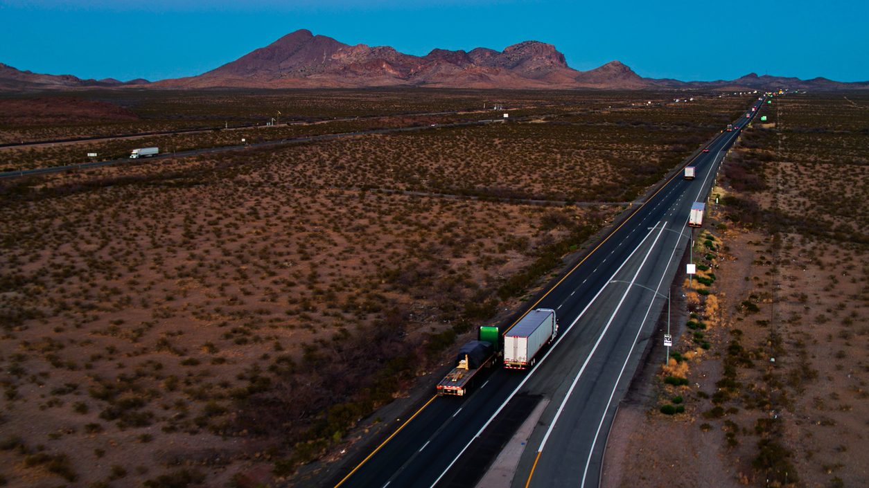 Aerial view of trucks on Interstate 10 near the Arizona and New Mexico border