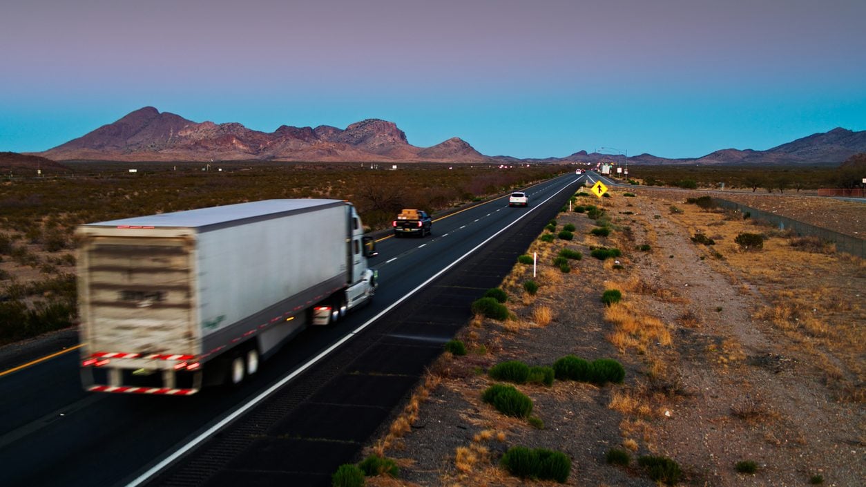 Truck on Interstate 10 in Arizona at dusk