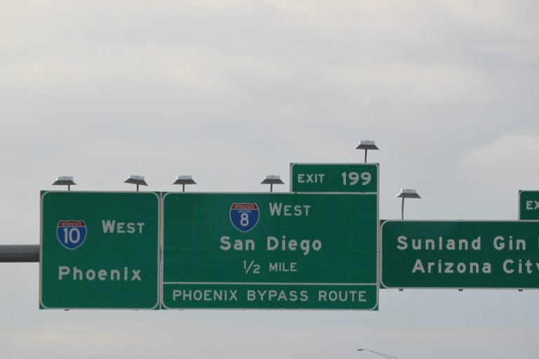 Overhead Interstate 10 west signs for Phoenix and San Diego in Arizona
