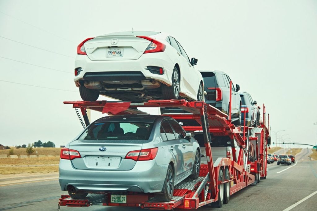 Loaded car hauler on a highway in Colorado