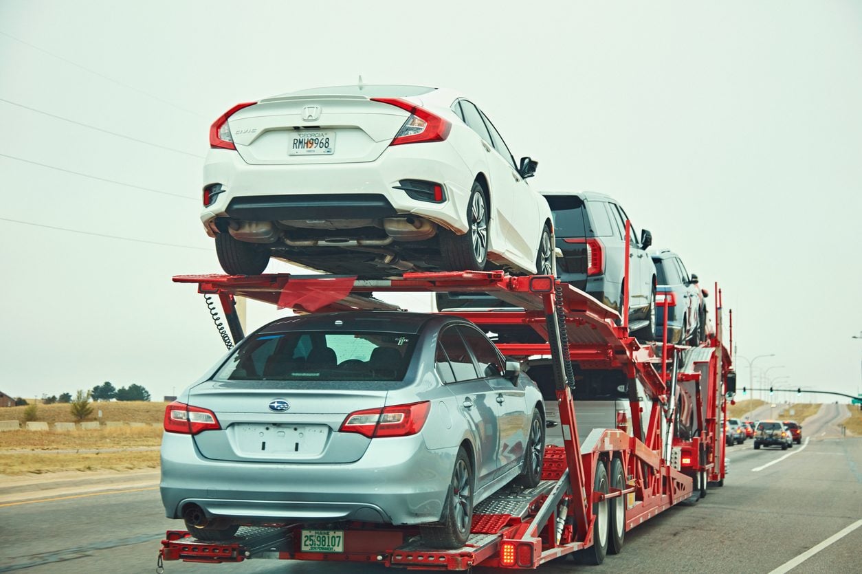 Loaded car hauler on a highway in Colorado