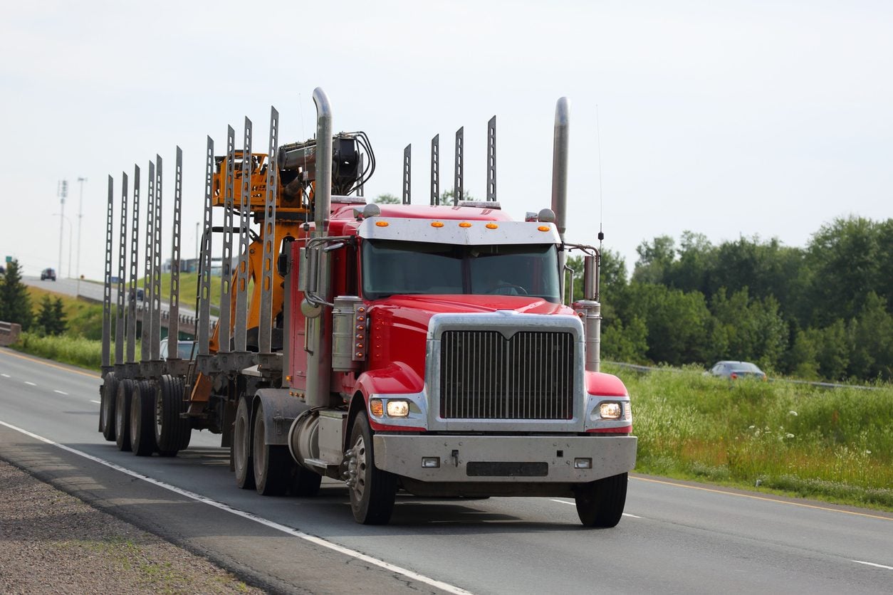 Tractor trailer hauling a load on an interstate highway
