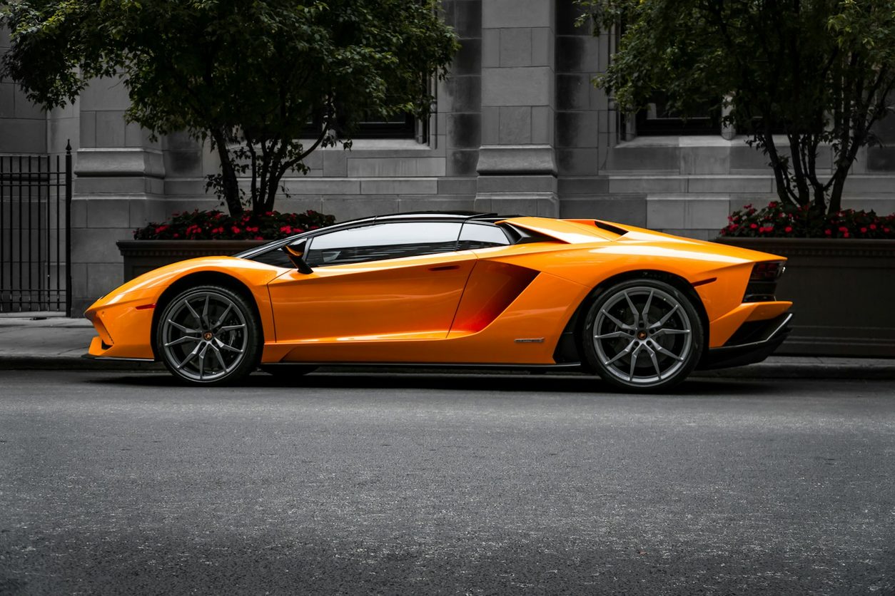 Orange Lamborghini Aventador seen from the side