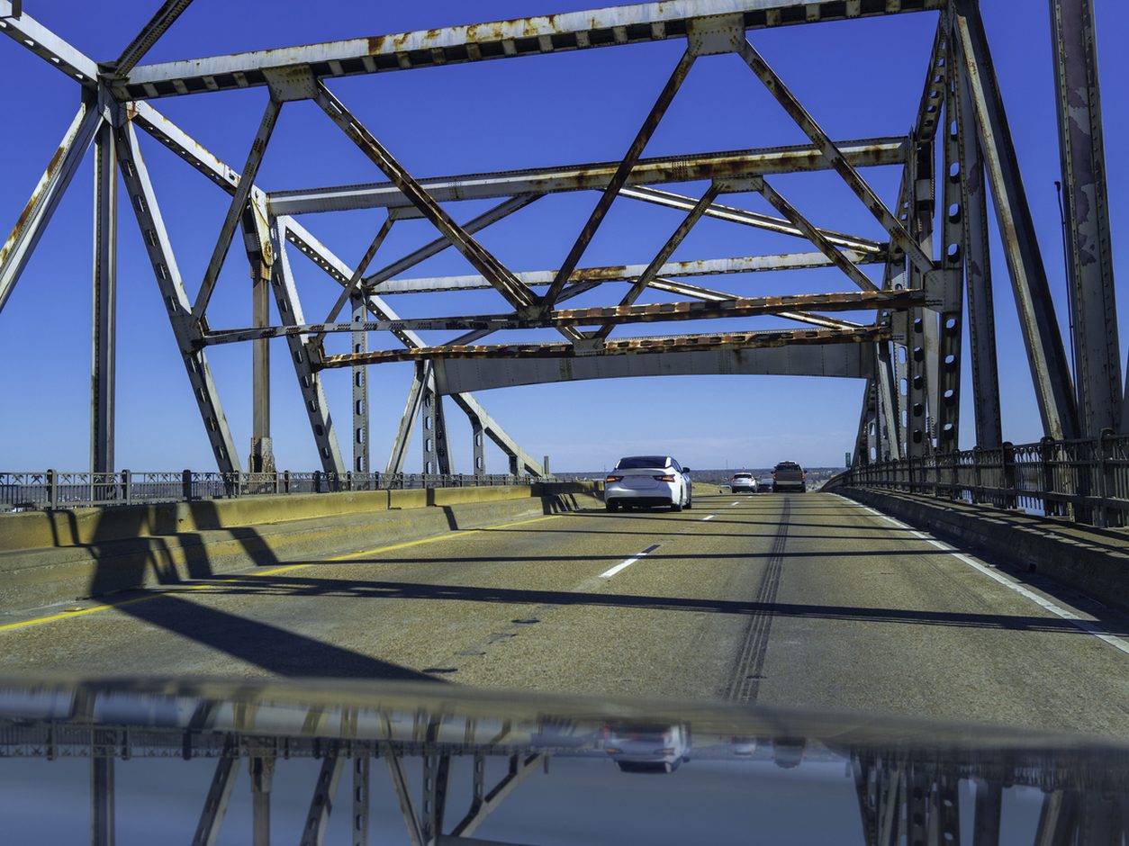 Driving across a steel truss bridge on Interstate 10 in Louisiana