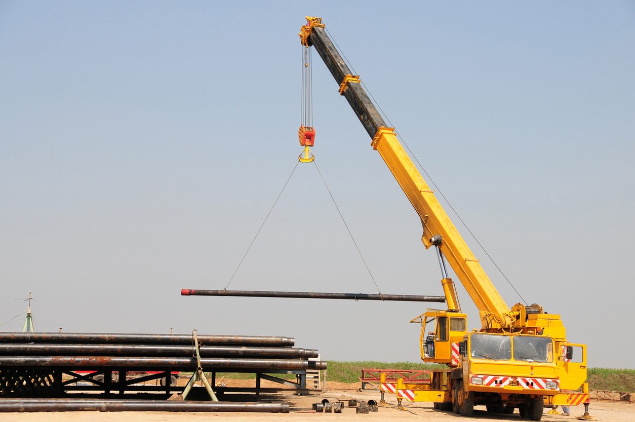 Mobile crane lifting on a construction site