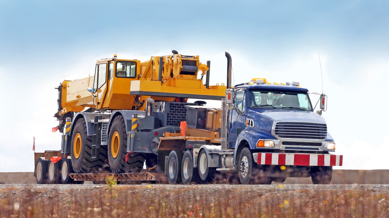 Mobile crane loaded on a multi axle lowboy trailer
