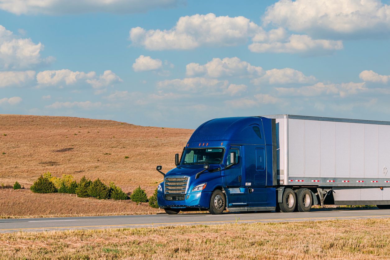 Semi truck running Interstate 70 west across Kansas