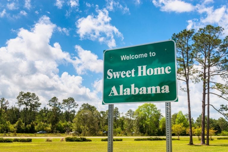 Welcome to Sweet Home Alabama road sign beside a highway